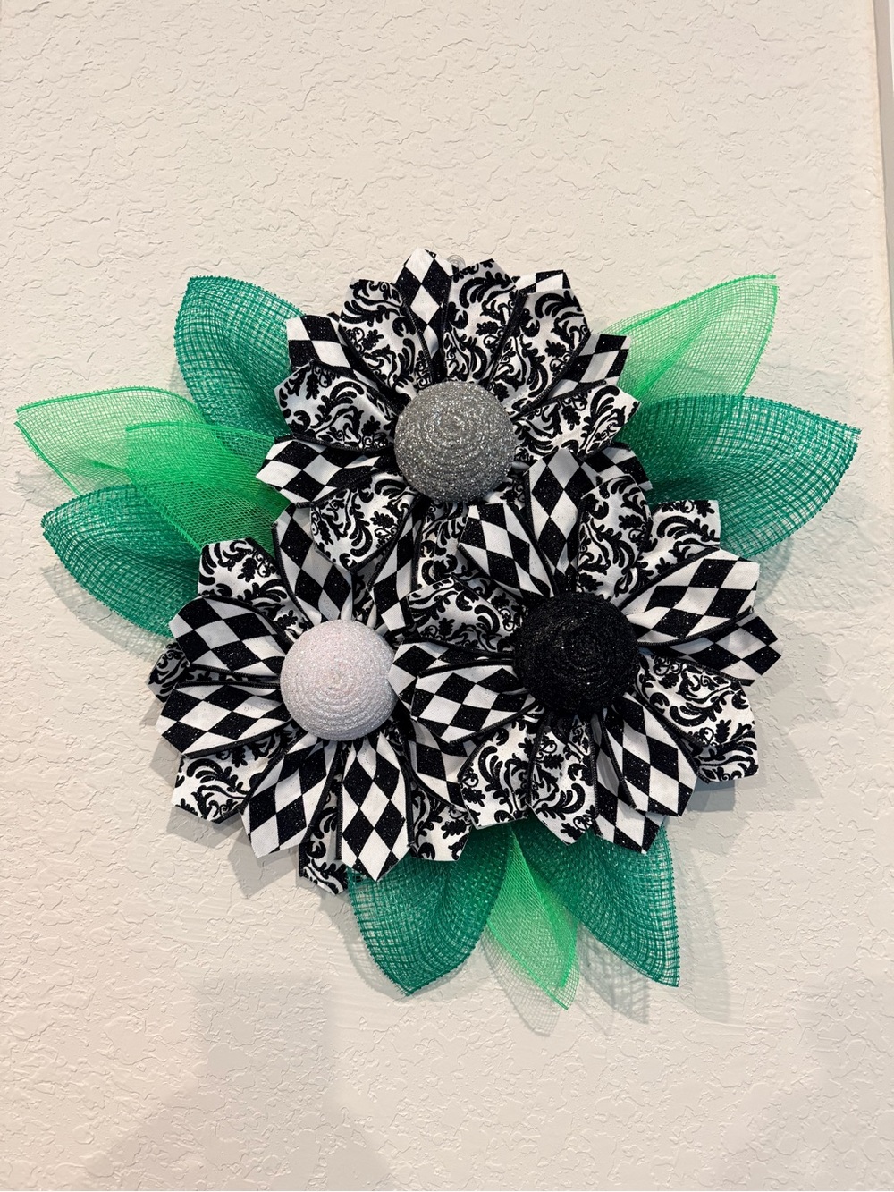 Black & White Patterned Floral Wall Accent with Green Mesh Leaves